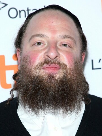 Menashe Lustig Headshot