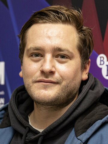 Benjamin Helstad Headshot